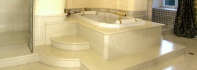 Bathroom Design. Luxury Bathroom with White Perlino Stone - Side view of the Bath tub made from Natural Stone Bianco Perlino.jpg
